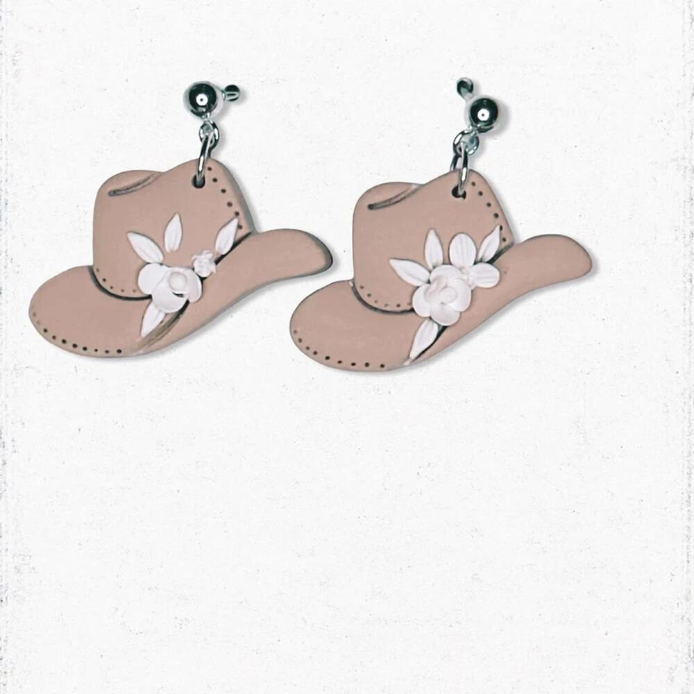 6105. Plastic Cowgirl Earrings